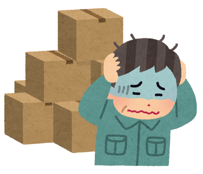 在庫で頭を抱える男性